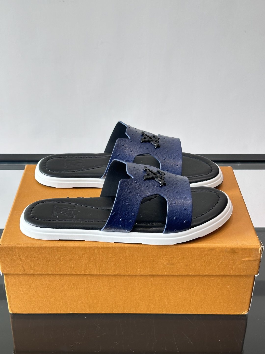 Louis Vuitton Embossed Blue Slide Sandals