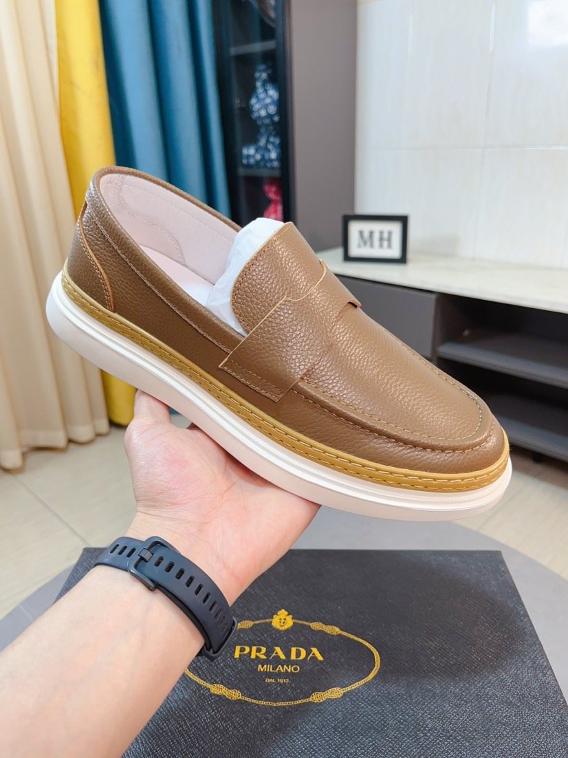 Prada Textured Slip-On Shoes