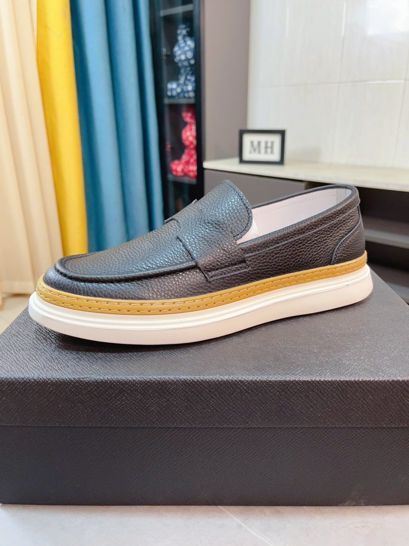 Prada Textured Slip-On Shoes